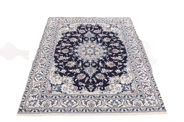 Nain Persian Rug 146 × 199 cm, Wool and Silk, hand-knotted — view 2 Nain Persian Rug 146 × 199 cm, Wool and Silk, hand-knotted — view 2